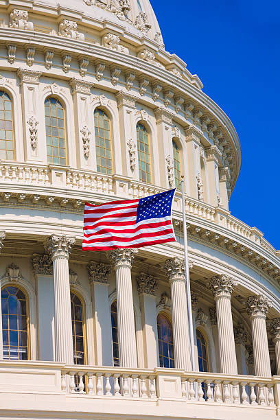 istock Capitol building Washington DC american flag USA 476440810