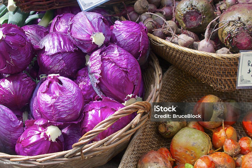 Farmers market vegetables Purple cabbage and two types of beets at the farmer's market Agricultural Fair Stock Photo