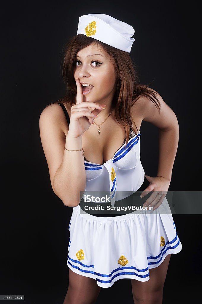 Marinero joven hermosa mujer con el dedo en los labios - Foto de stock de 20-24 años libre de derechos