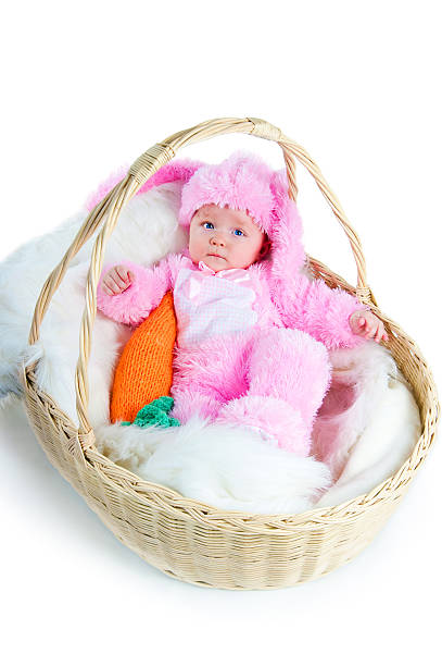 istock funny newborn baby dressed in Easter bunny  suit 476443536