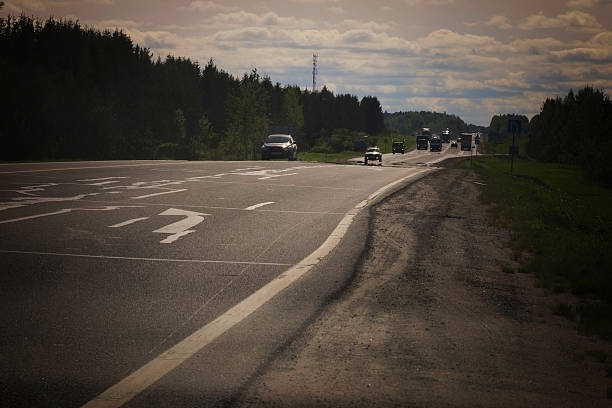 istock rural landscape road stretches into the distance 476444610