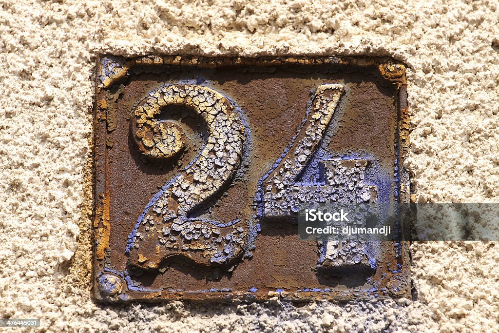 House number on a wall House numbers in different styles and colors (concept for real estate) Activity Stock Photo
