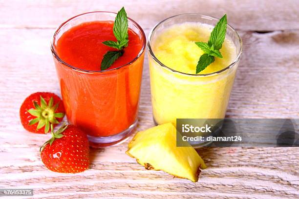 Strawberry Pineapple Smoothie In Glass With Mint Berries Stock Photo - Download Image Now