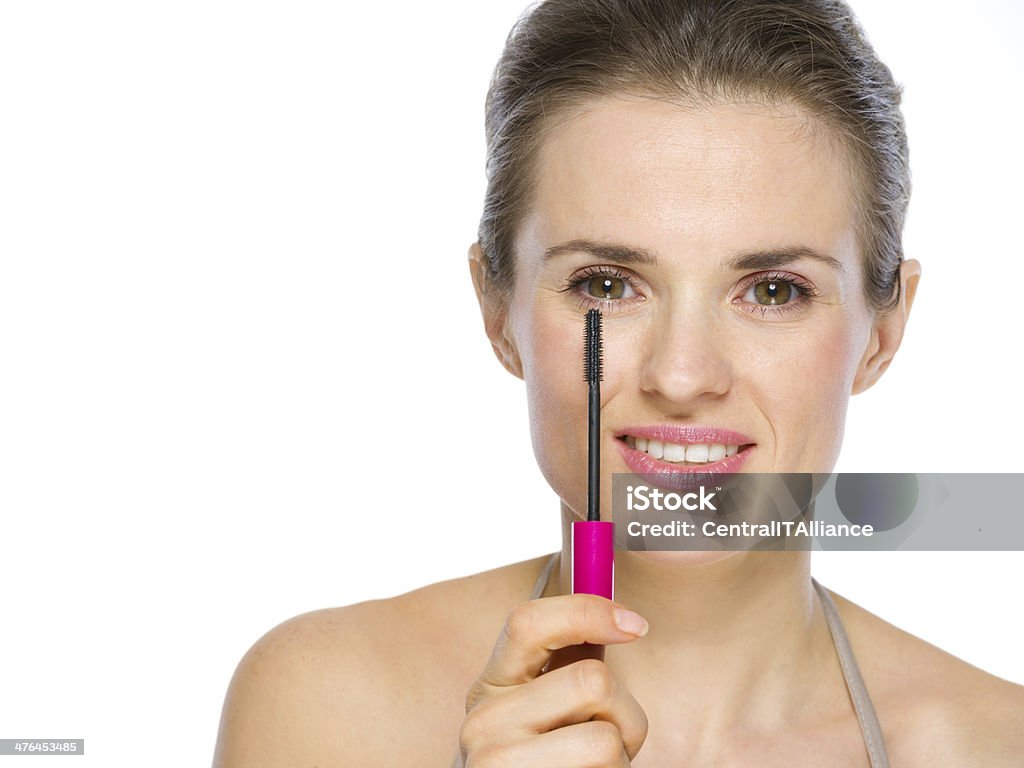 Schönheit Porträt der jungen Frau hält Wimperntusche brush - Lizenzfrei Braunes Haar Stock-Foto