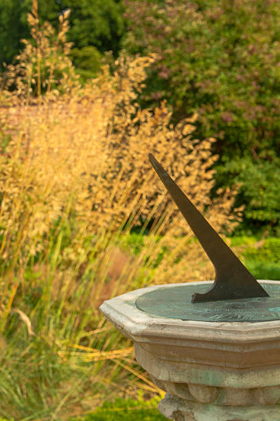 istock Sundial in a walled garden 476453694