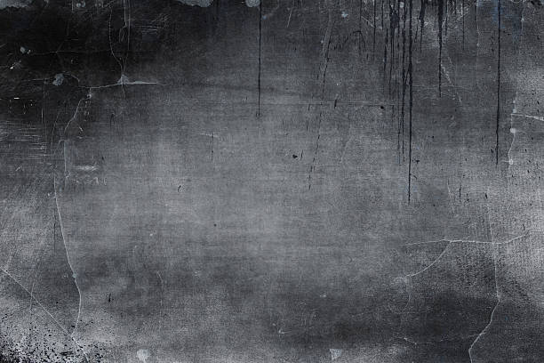 istock Grunge style weathered black background 476454156