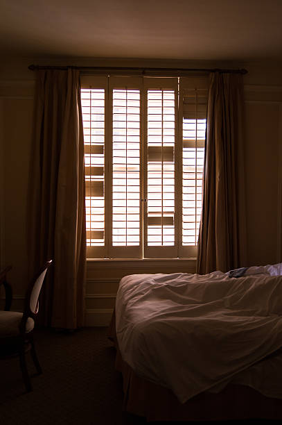 istock Waking Up in a Hotel Room 476457810