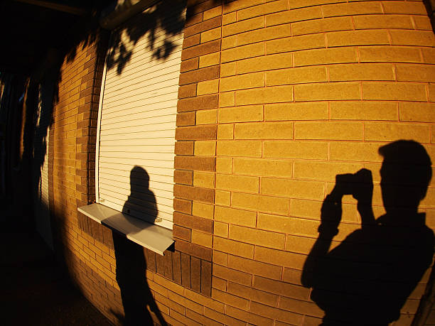 istock The shadow of a man with a camera 476458128