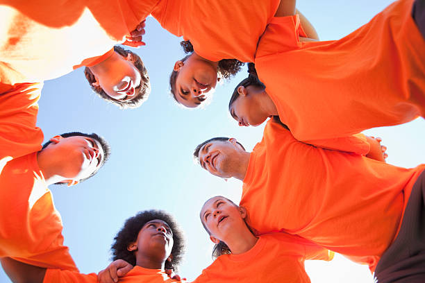 istock Coach with group of children 476459133