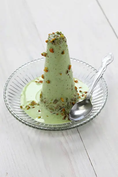 kulfi is a popular frozen dairy dessert, traditional indian ice cream