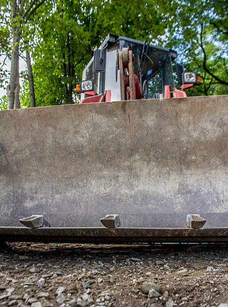 istock excavator in the countryside 476460083