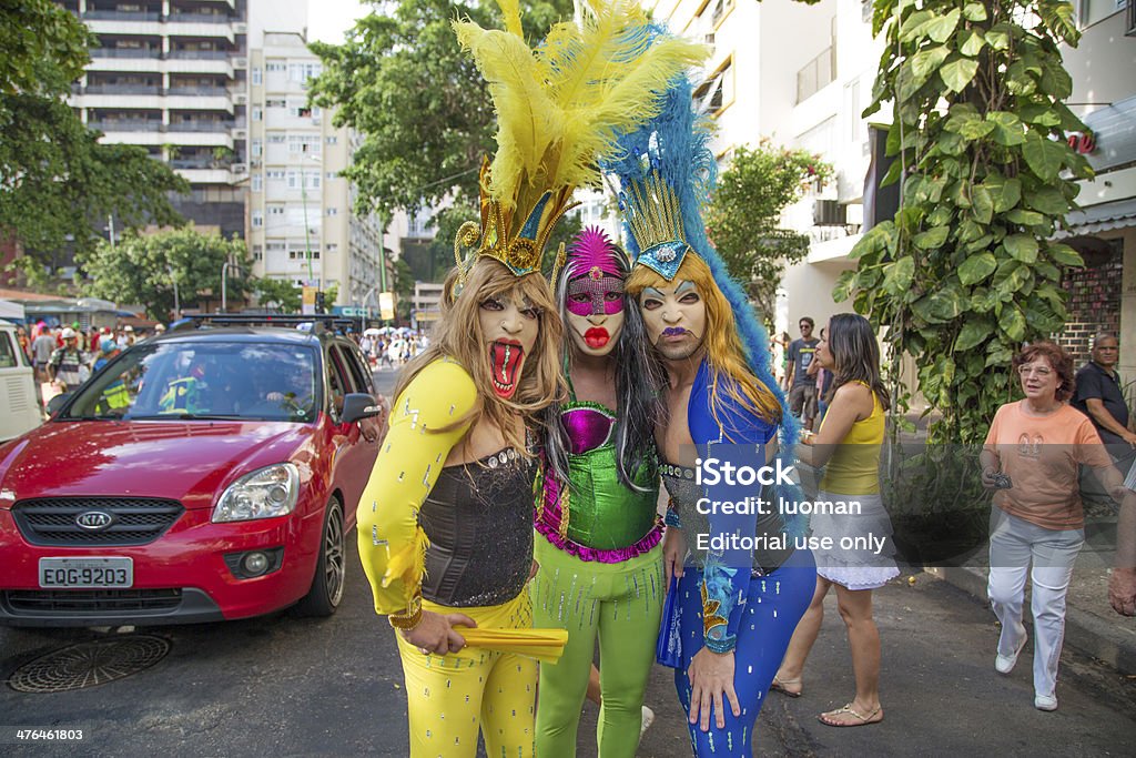 Street Carnival in Rio Rio de Janeiro, Brazil - March 1, 2014: Three drag queens photographed few minutes before Ipanema Band 50th Parade in the middle of the street Adult Stock Photo