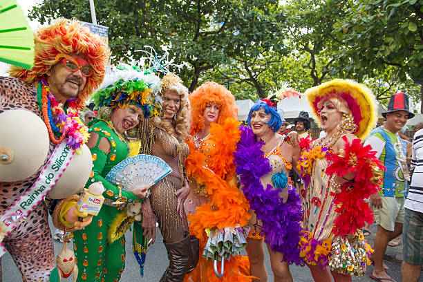 Street Carnival in Rio Rio de Janeiro, Brazil - March 1, 2014: Group of drag queens photographed few minutes before Ipanema Band 50th Parade nudie suit stock pictures, royalty-free photos & images
