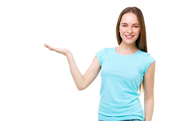 istock Young woman presenting something with open hand isolated. 476462056