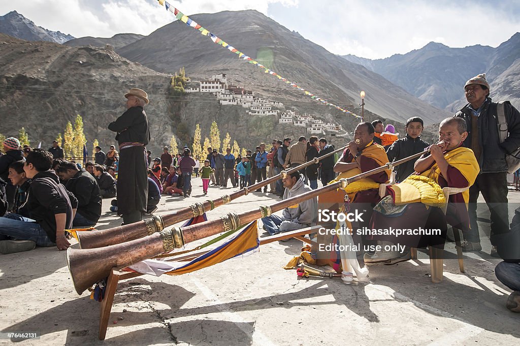 Diskit Festival Diskit,Ladakh,India -October 14,2012:Unidentified buddhist lamas(monks) with trumpet during Diskit Festival at Diskit monastery in Diskit,Ladakh, India. Adult Stock Photo