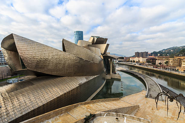 Bilbao, Spain - December 4, 2013: Guggenheim Museum Bilbao is a museum of modern and contemporary art designed by Canadian-American architect Frank Gehry in 1997, located in Bilbao, Basque Country, Spain