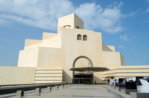 Doha, Qatar - January 12, 2014: The modern architecture of the Museum of Islamic Arts (MIA) in the city center of Doha, the capital of the Arabian Gulf country Qatar on January 12, 2014.