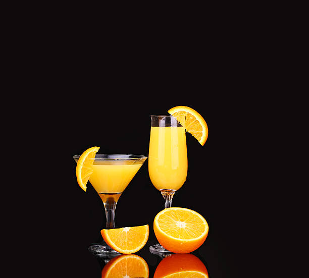 istock fresh organic orange juice and vodka 476465304