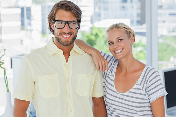 istock Attractive designer leaning on the colleagues shoulder 476466071