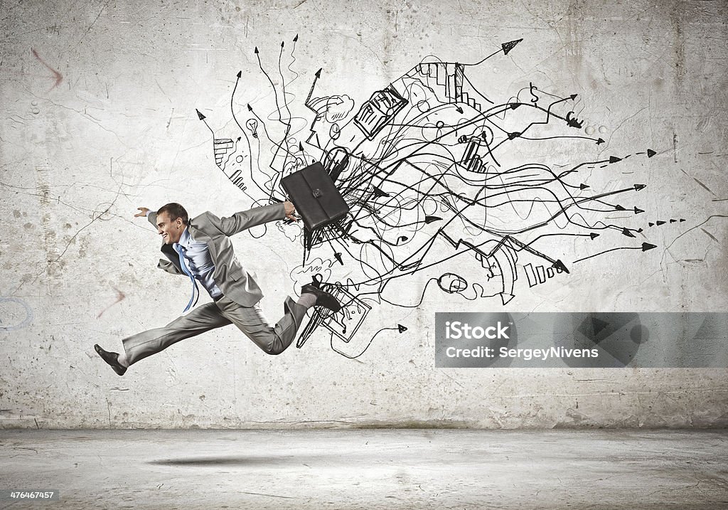 Jumping businessman Image of businessman in jump against sketch background Adult Stock Photo