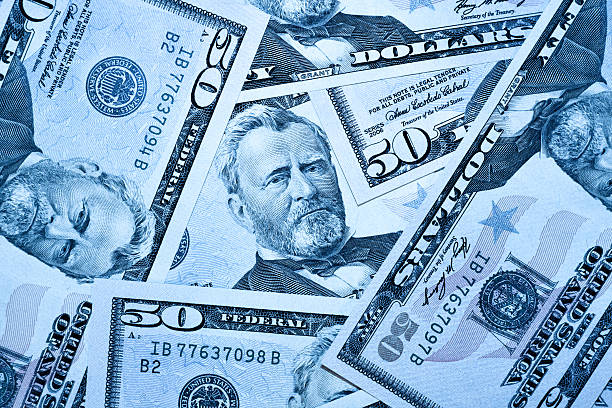 istock heap of fifty dollars 476467713