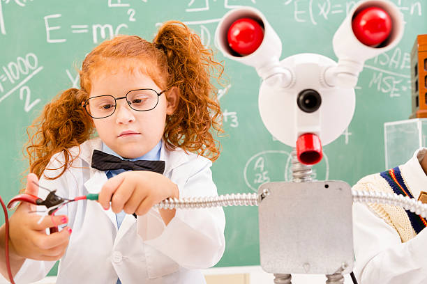 istock Education:  Retro revival children making robot in science lab. 476471785