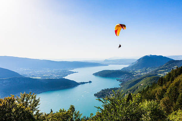 View of the Annecy lake from  Col du Forclaz View of the Annecy lake from  Col du Forclaz paraglider stock pictures, royalty-free photos & images