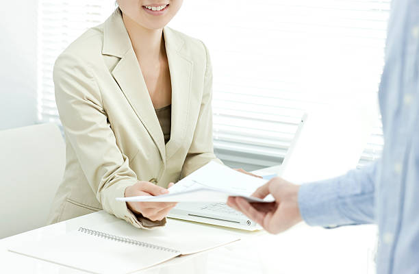 istock The businesswoman who receives documents 476474823