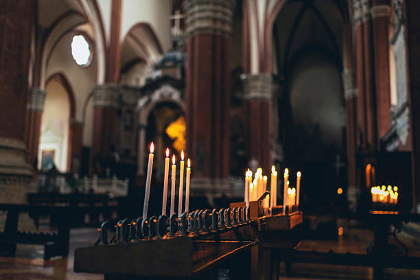 istock Rows of burning spiritual candles 476477000