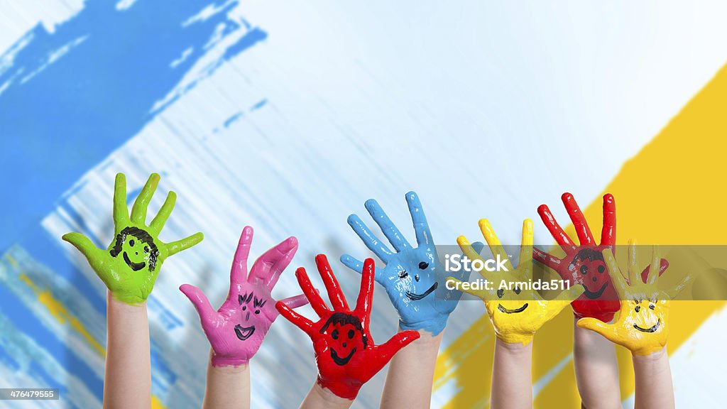 children's hands children's hands painted with paints Paint Stock Photo