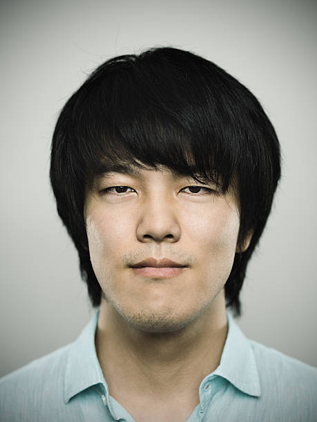 istock Portrait of a young japanese man looking at camera 476480046