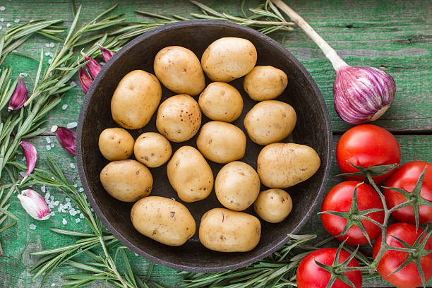 istock Potatoes for roasting with rosemary  and  garlic 476483426
