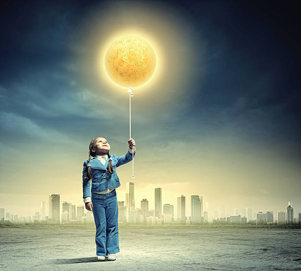 istock Little cute girl with globe 476487569