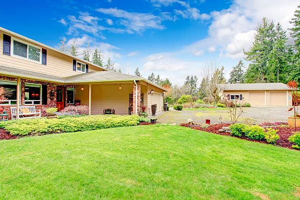 istock Two story house with attached garage and open column porch 476488603