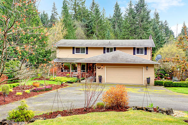 istock Two story house with attached garage and open column porch 476488689