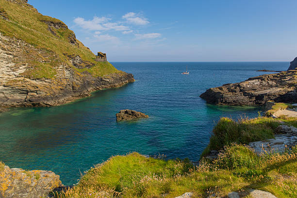 istock Blue sea and sky Tintagel bay Cornwall 476489011