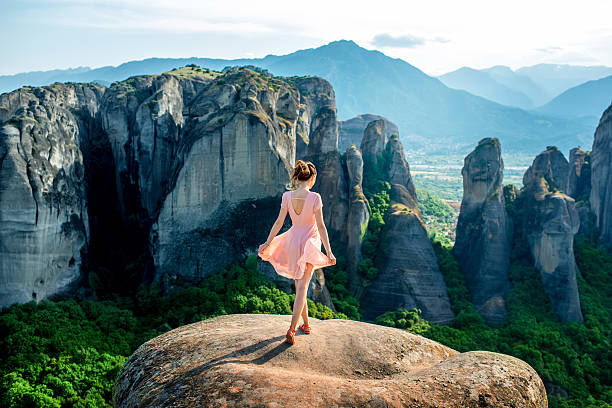 istock Woman enjoying nature on the mountains 476494458