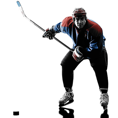 one caucasian man ice hockey player  in studio  silhouette isolated on white background