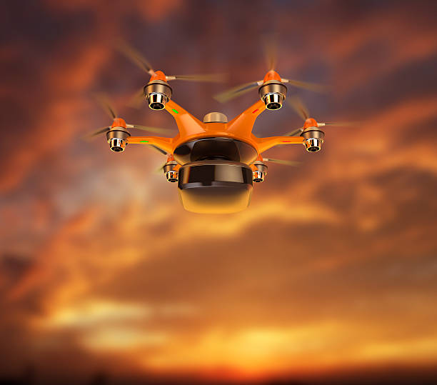 istock Hexacopter carrying cargo flying in the sunset sky 476495716