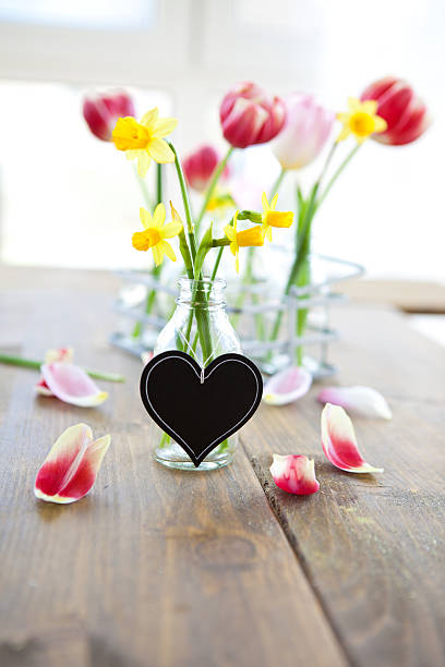 istock Fresh narcissus in little bottle 476497601