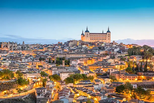 Toledo, Spain town skyline at the Alcazar at dawn.