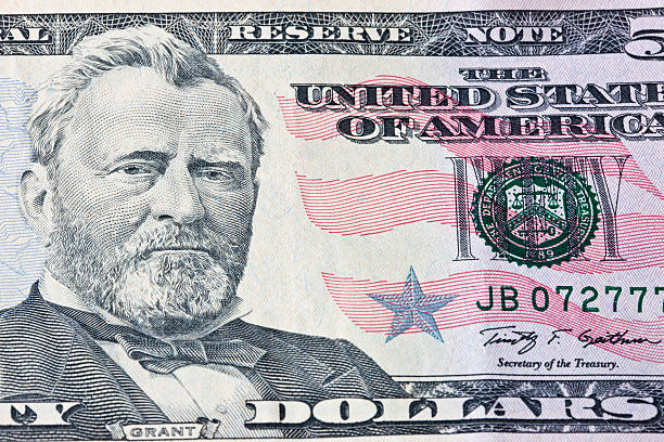 istock Close Up of Franklin on Hundred Dollar Bill 476498405