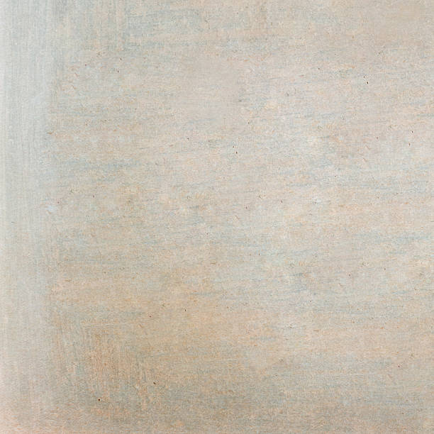 istock beige ancient textured surface - pastel colors on paper background 476499486