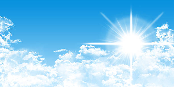 istock cumulus clouds and bright sun on blue background, cloudscape panorama, 476502020