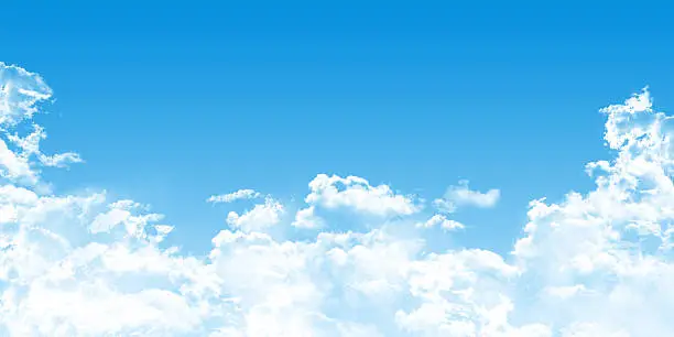 Photo of cumulus clouds on blue background, cloudscape panorama,