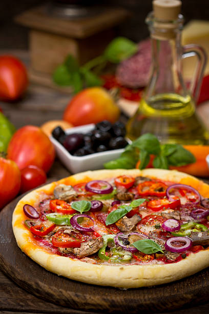istock Pizza with ham, mushrooms and cheese 476502485
