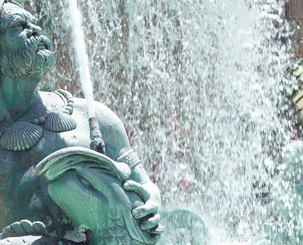 istock Male Sculpture In Water Fountain 476505882
