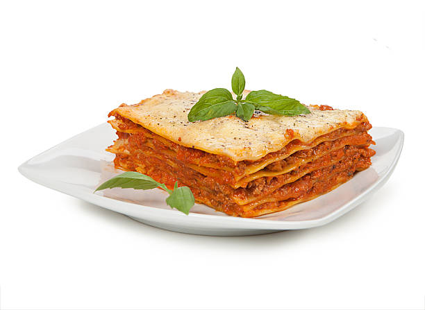 istock Tasty lasagna isolated on plate 476512638