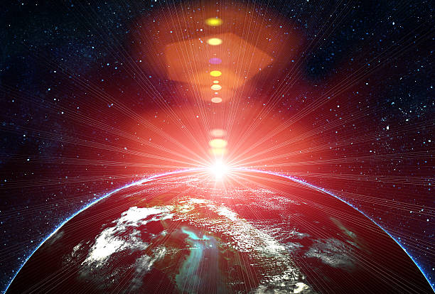 istock blue earth in space with rising sun 476516519