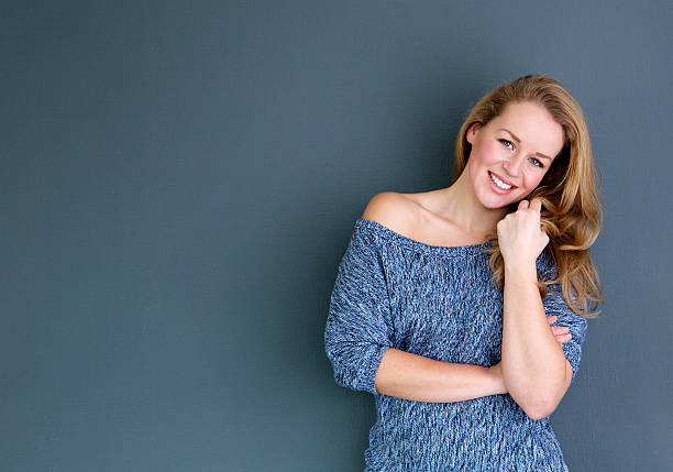istock Beautiful young blond woman smiling 476518117